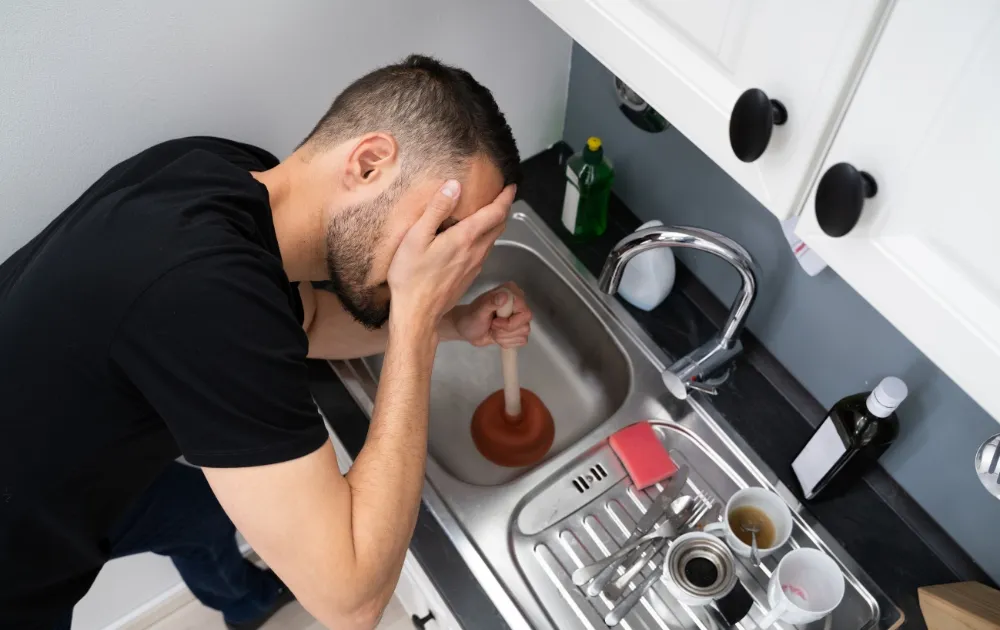 a problematic man and a blocked drain