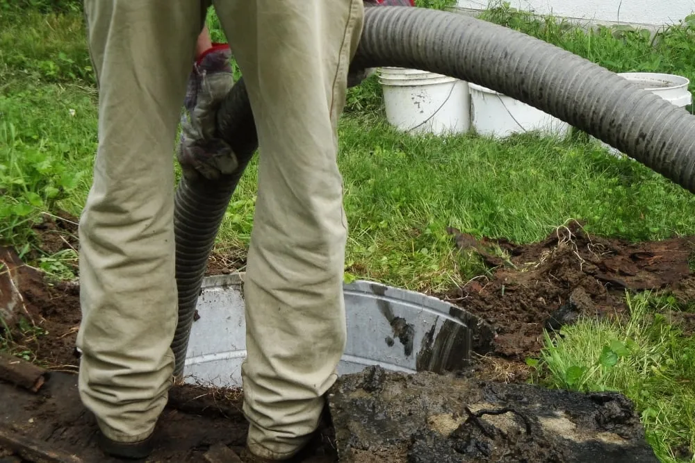 How to Clear Sludge From Septic Tanks