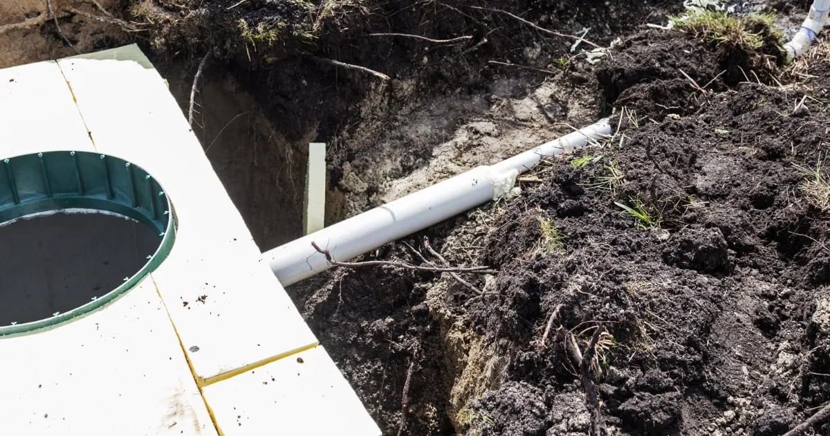 a plumbing tube connected to the septic system