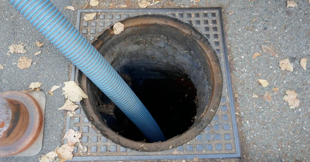 a plumbing tube and septic tank