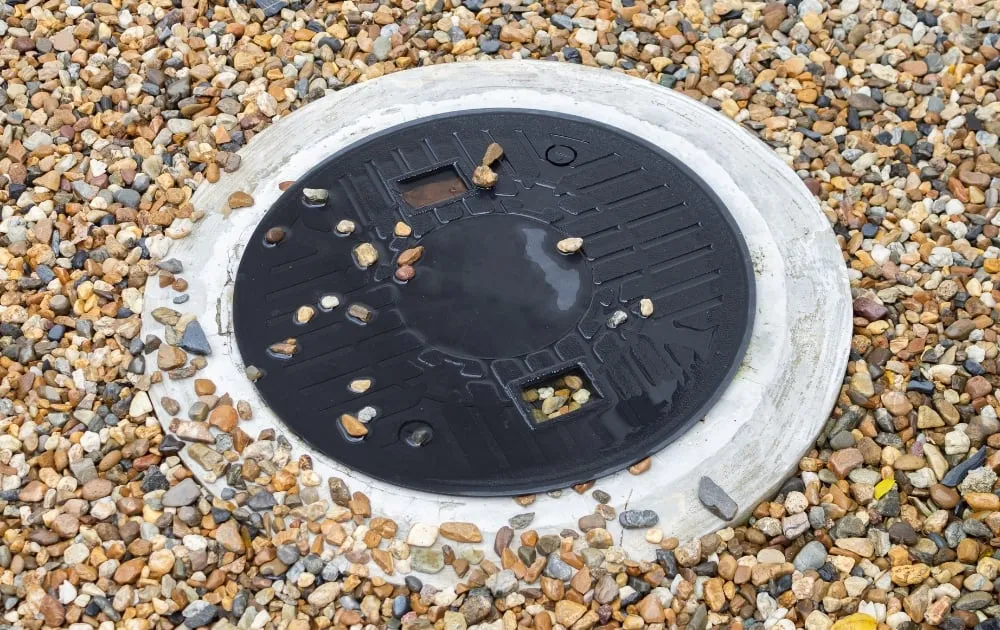 septic tank with pebbles around it