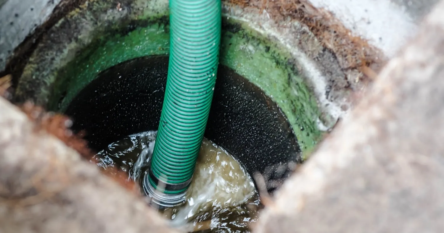 septic tank and green plumbing tube
