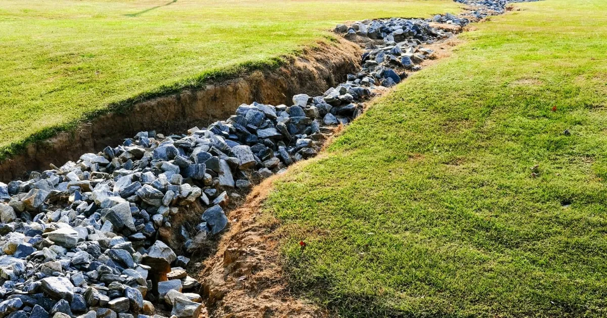 absorption trench covered with rocks